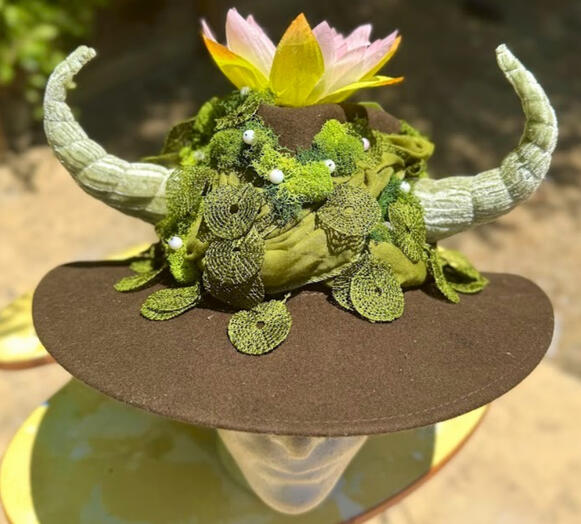 Iridescent pink pearl bead details.