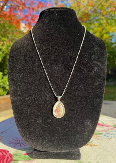 Rat Silver Teardrop Pendant. 22" beaded non-adjustable chain. 1"