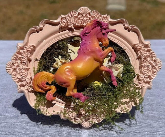 Sunset Unicorn | pink-marigold unicorn w/ real flowers on 3" wide light pink portrait frame | $30