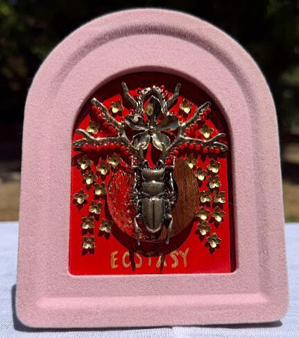 ECSTASY | Brass beetle, brass & gold jewels, resin / wood pendant, sealed in resin | $25