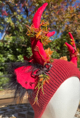 4 small scorpions, 2 on each side.