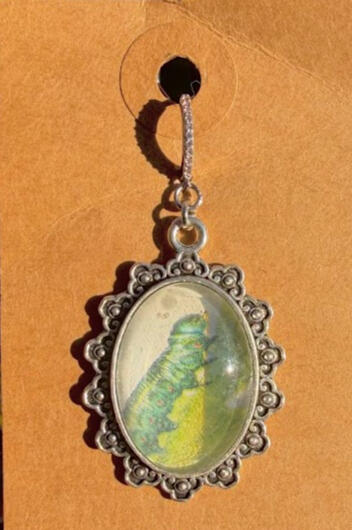 Single earring! Rough prominent moth larva. Silver hoop bedazzled w/ shiny gems. Approx 2.2&quot; in length. $13