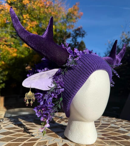 Deep purple beanie (unlined) with deep purple velvet antlers. Matching deep purple velvet ears with lavender inner ear. Upcycled brass &amp; amethyst glass earrings (removable).