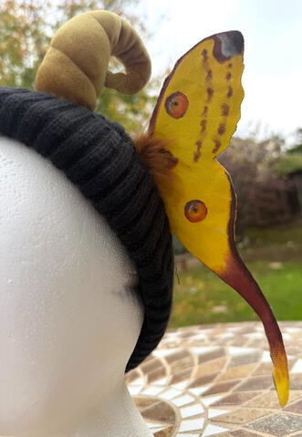 Unlike the Chinese Moon Moth beanie, these wings have wiring making them slightly more adjustable but add a bit more weight to it.