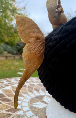 Back of the ears are lined with faux fur &amp; gold velvet that matches the horns.