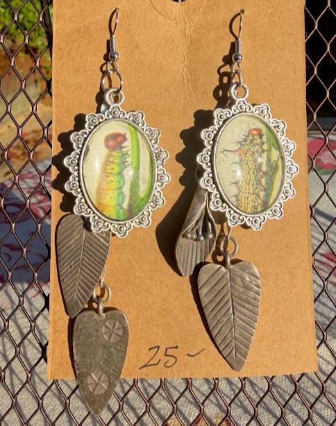 Rough Prominent Larva &amp; Red Humped Larva. Silver fish hook earrings w/ antique silver dangling accents. Approx 3&quot; drop. $25